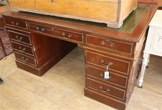 A large reproduction mahogany pedestal desk W.154cm